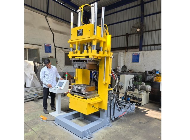 Vertical GDC machine in operation with an operator at the control panel at Desire Hydraulics manufacturing unit, Pune