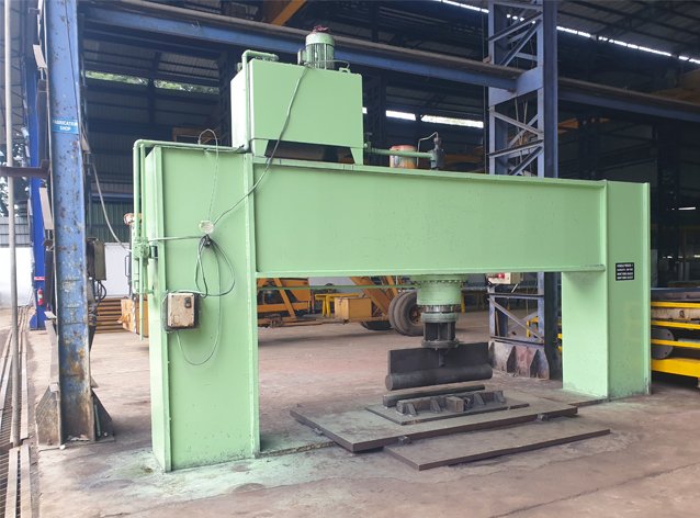 Gantry-type hydraulic press machine full view on the factory floor at Desire Hydraulics, Pune